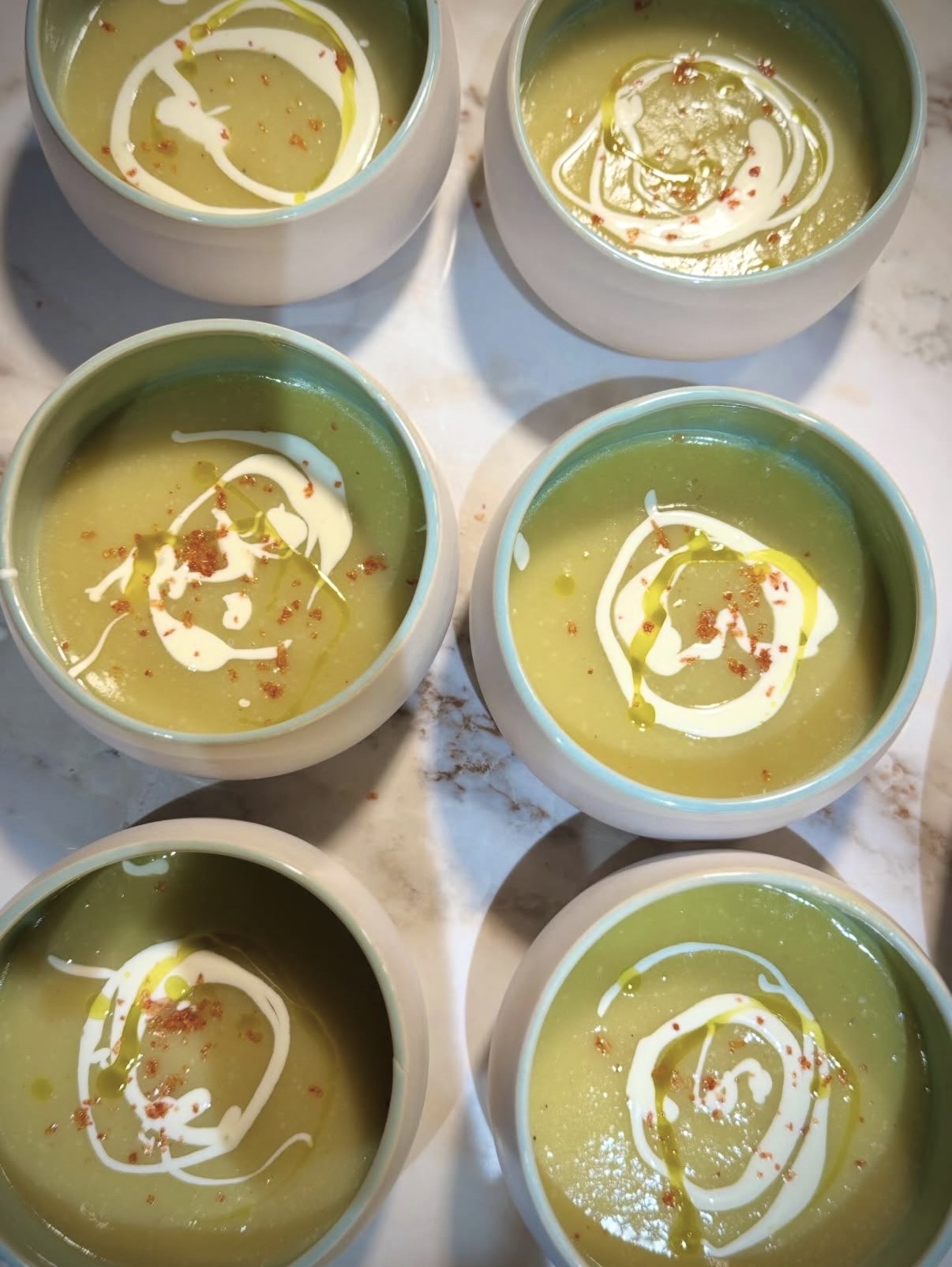 Velvety soup with olive oil and chili