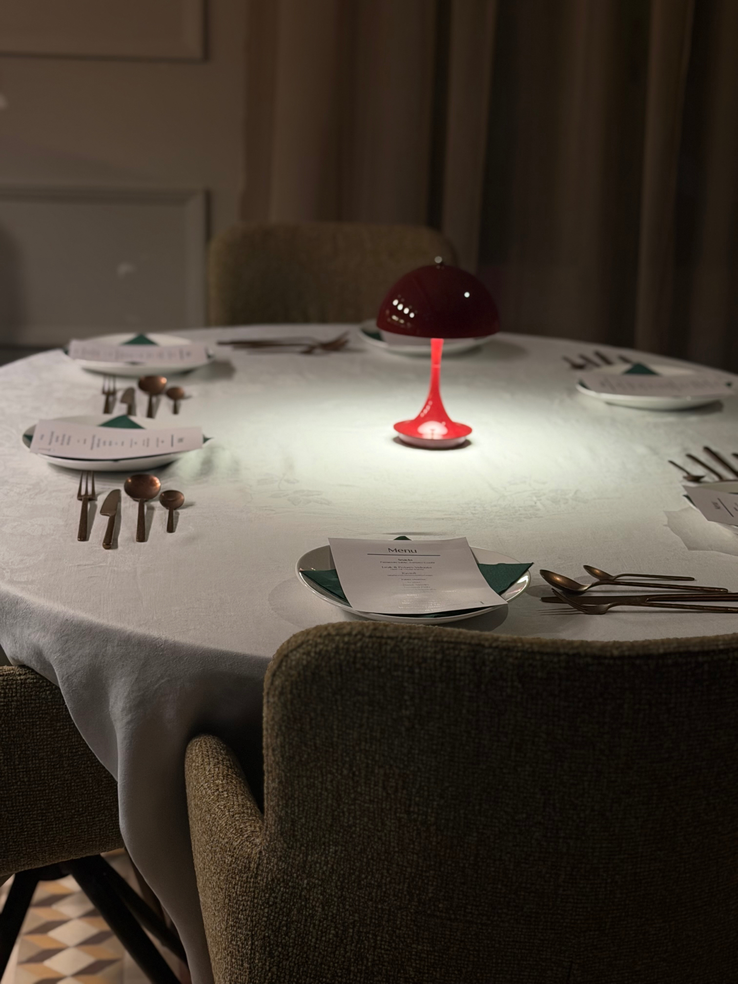 Intimate table setting with red lamp